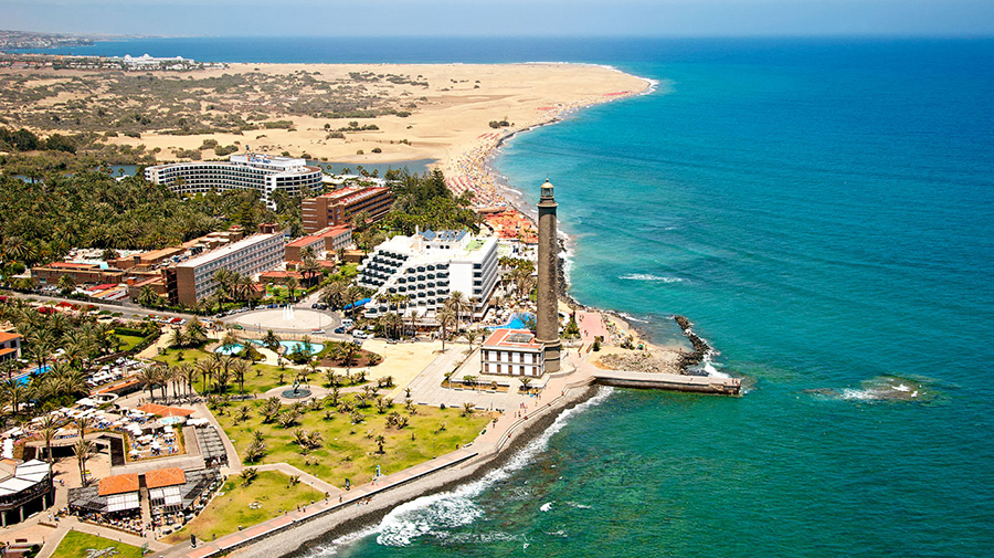 Playa de Maspalomas, nestel jezelf op een ligstoel en luister